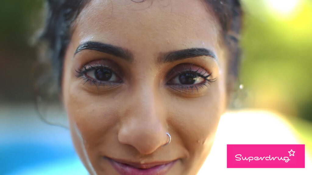 Woman testing waterproof mascara